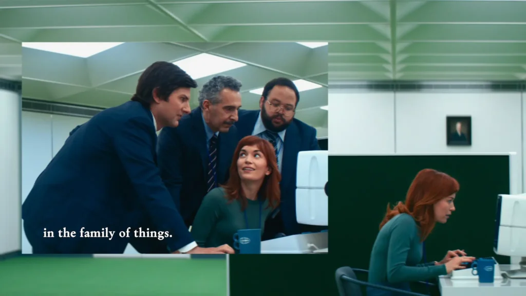 Helly and her coworkers from Severance sit around her desk.